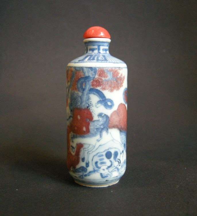 Porcelain snuff bottle decorated in underglaze blue and copper red with twelve animals of zodiac